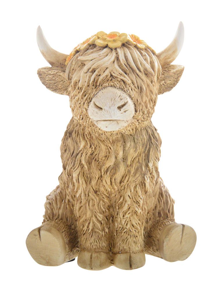 Highland Cow Sitting With Flower