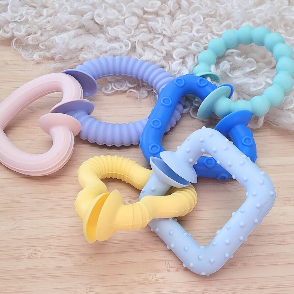 SILICONE SNAP & LEARN SENSORY TEETHERS